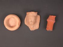 Appraisal: Grouping of Terracotta Items Grouping of terracotta items includes a