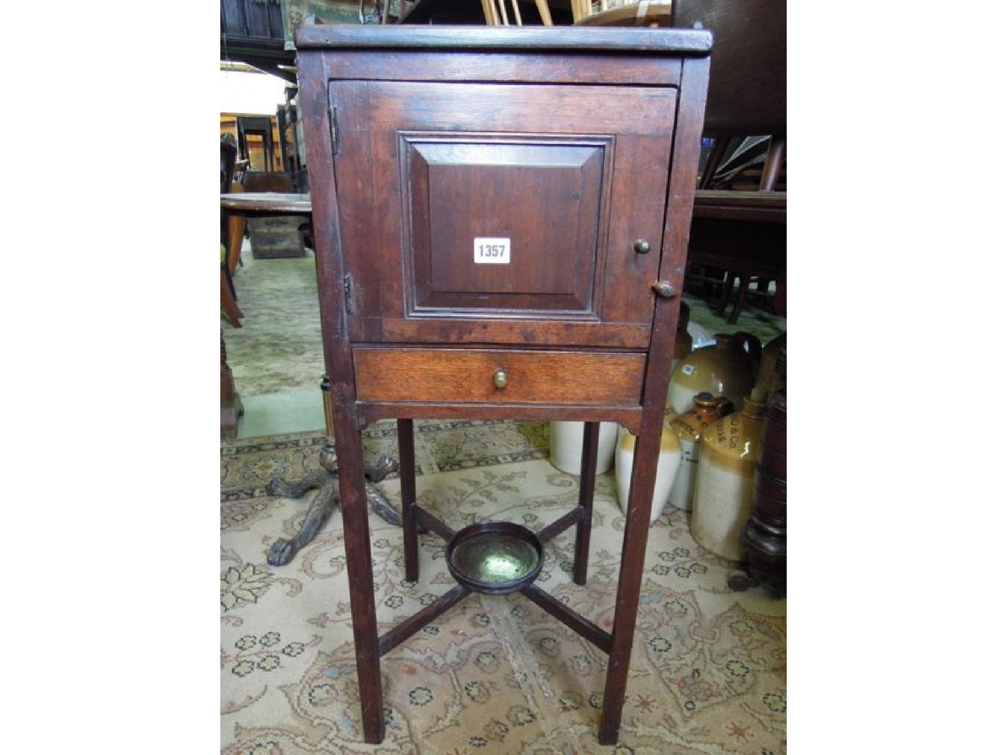 Appraisal: A Georgian style mahogany night cupboard of square cut form