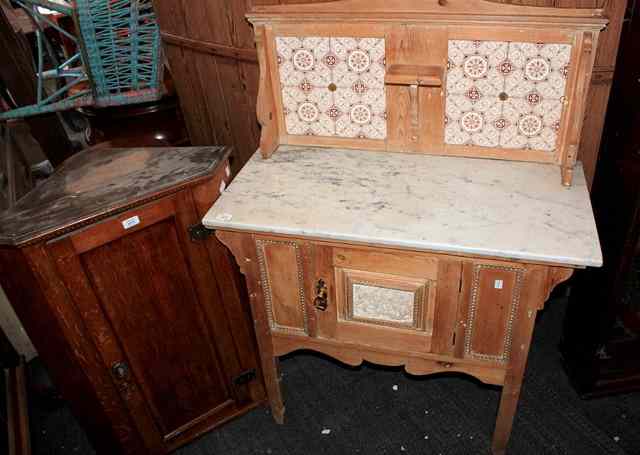 Appraisal: A VICTORIAN PINE WASH STAND with marble top and tiled