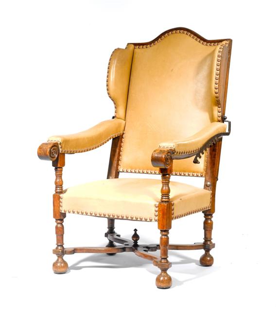 Appraisal: WING CHAIR Baroque style Walnut Upholstered seat on turned legs