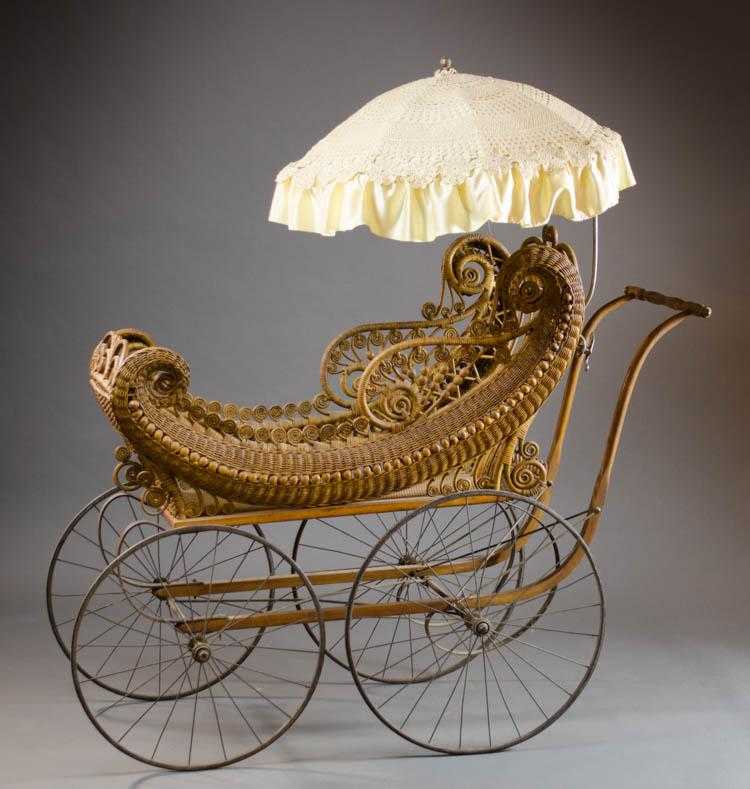 Appraisal: A VICTORIAN WICKER BABY CARRIAGE The Gendron Iron Wheel Co