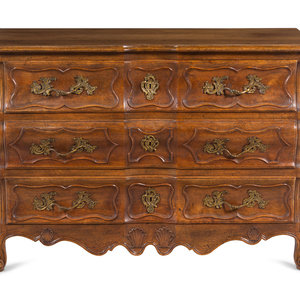 Appraisal: A French Provincial Shell-Carved Walnut Commode th Century Height x