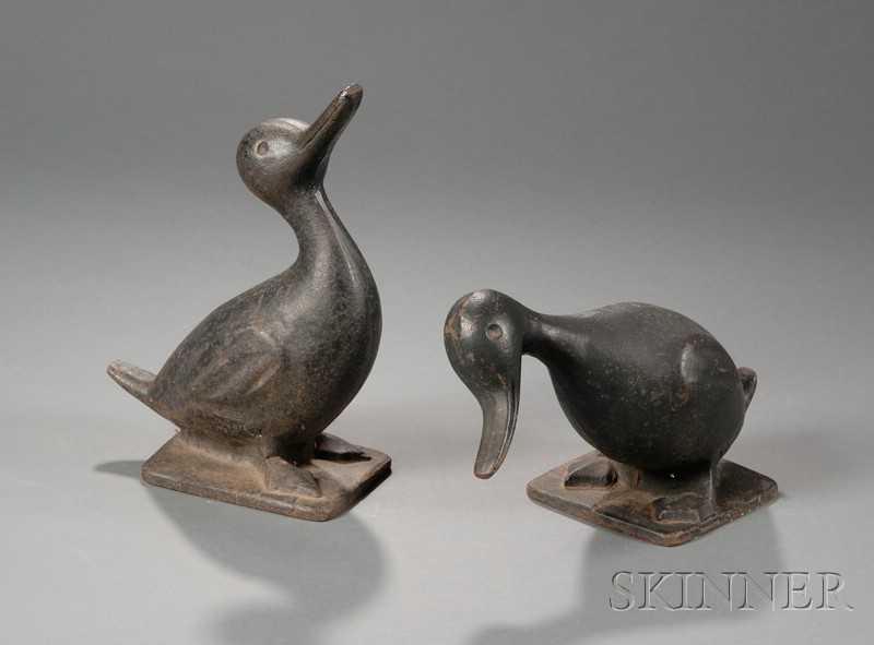 Appraisal: Two Black-painted Cast Iron Duck Garden Figures America early th