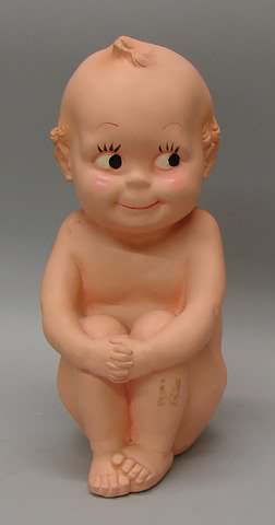 Appraisal: Compo chalk sitting Kewpie style bank A N BROOKS CORP