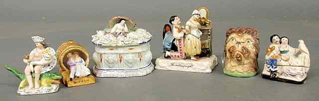 Appraisal: Six porcelain figural groups including a dog box h and