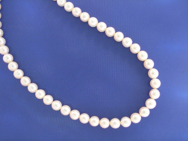 Appraisal: A - mm cultured pearl necklace with an ct gold