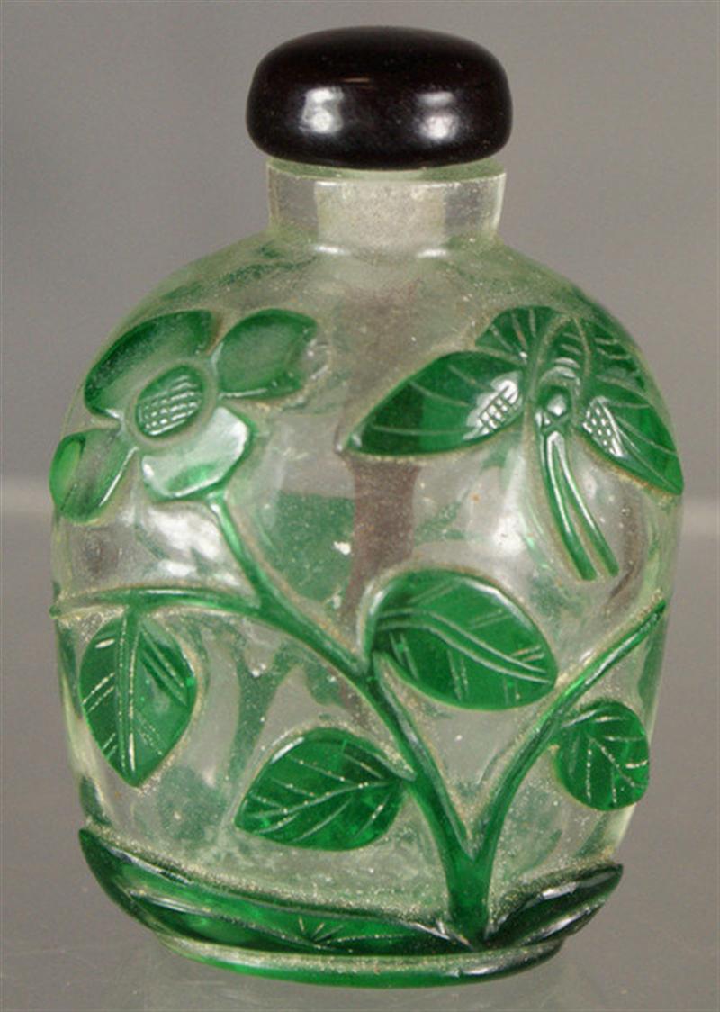 Appraisal: Green overlay clear glass purse shaped snuff bottle amethyst glass