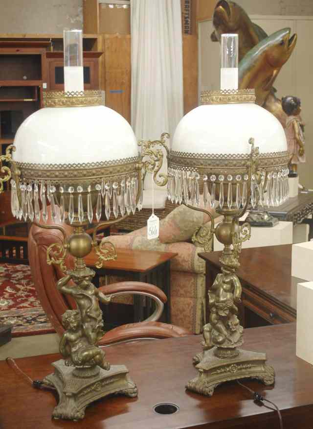 Appraisal: PAIR ENGLISH VICTORIAN STYLE TABLE LAMPS electrified having bronzed metal