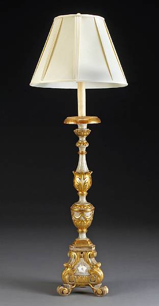 Appraisal: An Italian Baroque style painted and parcel gilt torch re