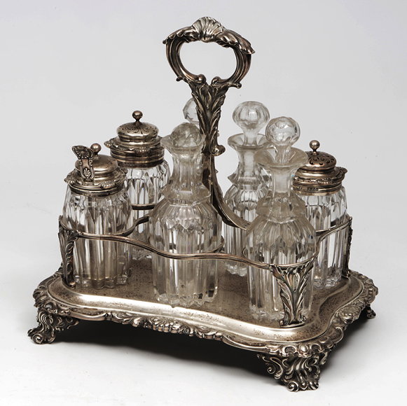 Appraisal: AN EARLY VICTORIAN SILVER CONDIMENTS SET with seven bottles and