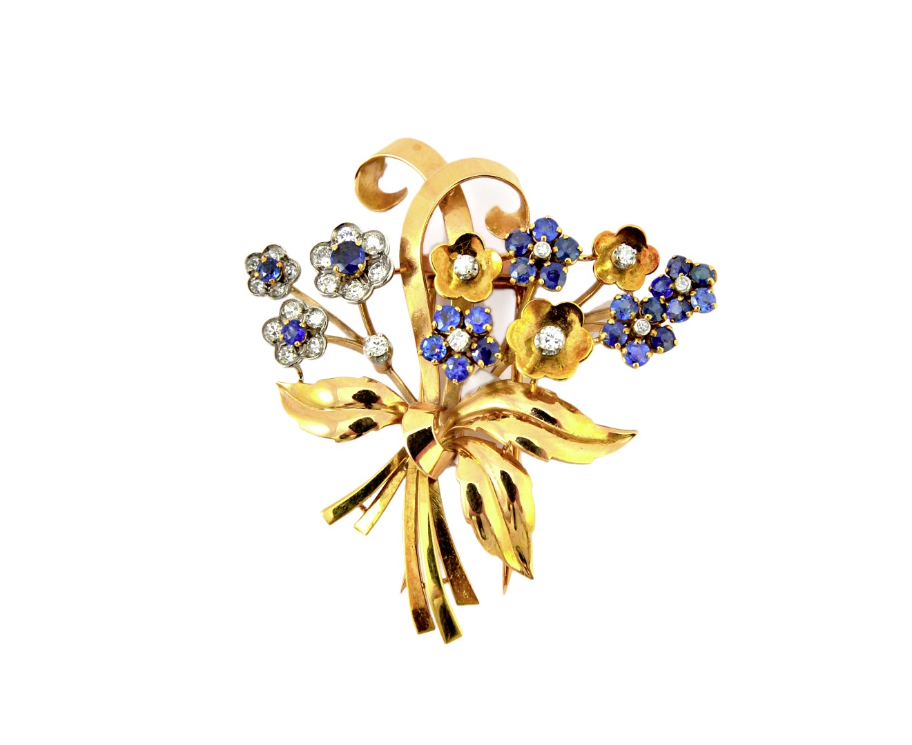 Appraisal: A two colour gold sapphire and diamond set brooch designed