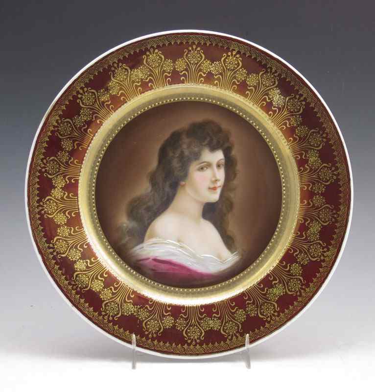 Appraisal: ROYAL VIENNA PORTRAIT PLATE Centering a raven haired beauty blue