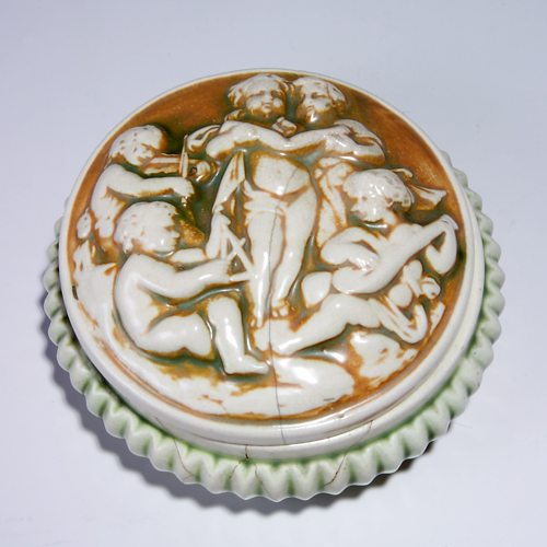 Appraisal: Rare ROSEVILLE Donatello covered powder box Several hairlines chip and