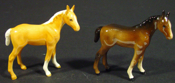 Appraisal: Two Beswick foals one tan gloss and one brown gloss