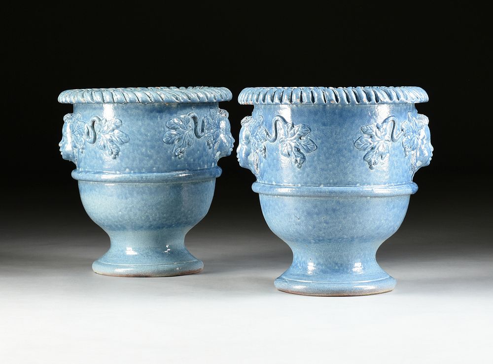 Appraisal: A PAIR OF CLASSICAL STYLE LIGHT BLUE GLAZED TERRACOTTA GARDEN