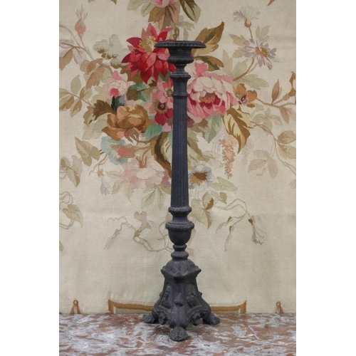 Appraisal: French cast iron church pricket with a black painted finish