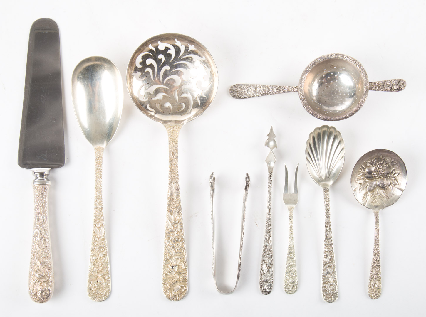 Appraisal: Assorted Kirk Repousse serving flatware items comprising large pierced serving