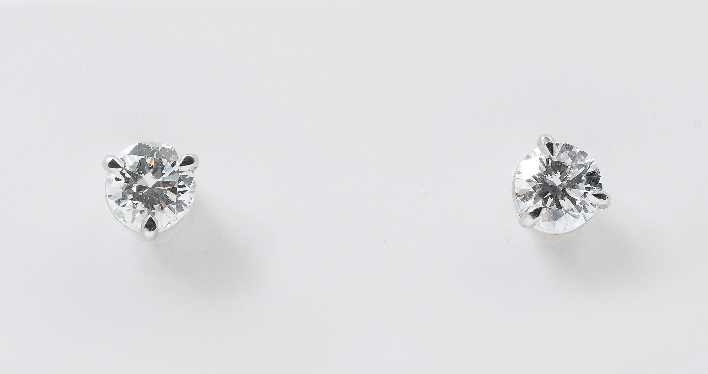 Appraisal: PLATINUM MARTINI SET CTW DIAMOND STUDS Martini set diamonds are