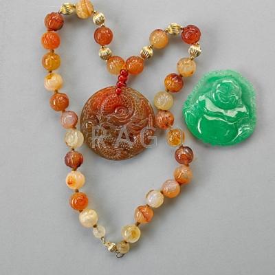 Appraisal: ASIAN CARVED HARDSTONE JEWELRY Nephrite Buddha pendant Dragon carved carnelian