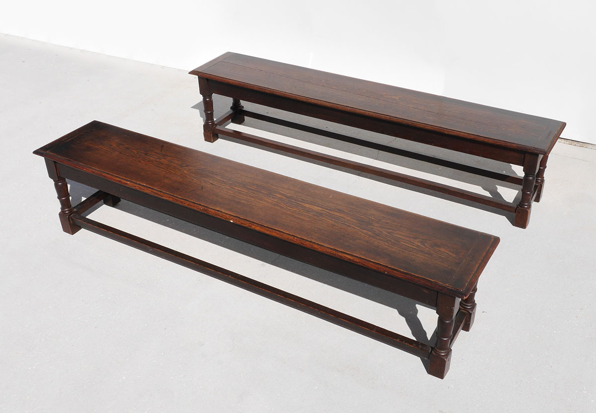 Appraisal: PAIR OAK COLLEGE STORAGE BENCHES Early th century hinged lift