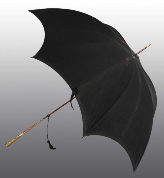 Appraisal: Black Umbrella with Gold Pearl Inlayed Handle Description Working Floral