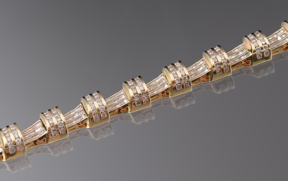 Appraisal: Ct DIAMOND BRACELET k yellow gold bracelet with waves of