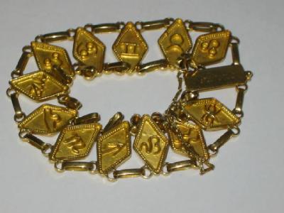 Appraisal: AN CT GOLD BRACELET the diamond shaped links applied with