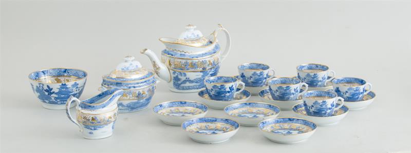 Appraisal: ENGLISH BLUE TRANSFER-PRINTED WILLOW PATTERN TWENTY-PIECE TEA SERVICE The pot