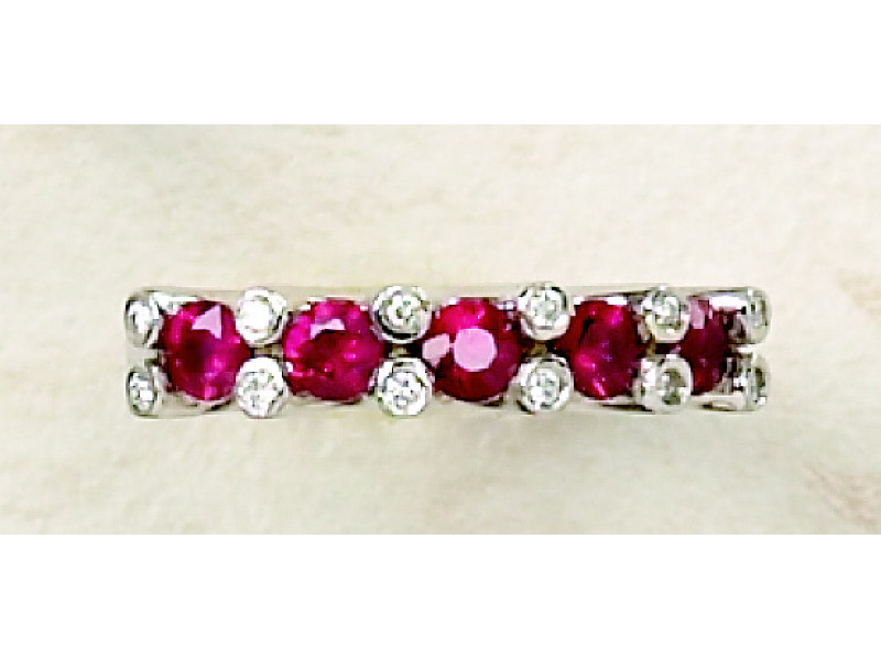 Appraisal: RUBY RING Lady's k white gold band style ring set