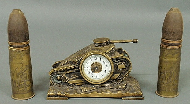 Appraisal: Brass tank-form clock works marked Made in Japan h x