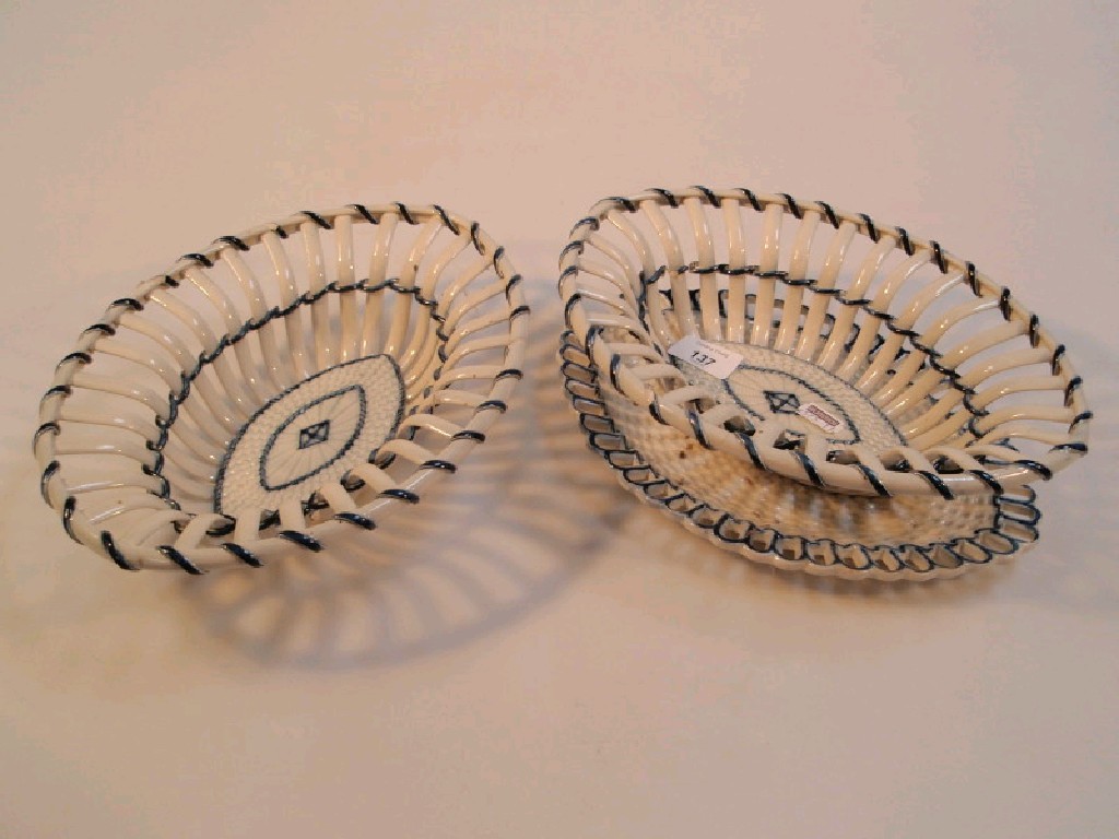 Appraisal: A pair of thC Pearlware chestnut baskets and a stand