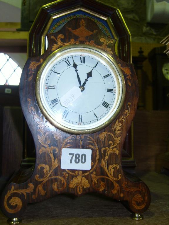 Appraisal: A late th century rosewood mantle clock in a Rococo