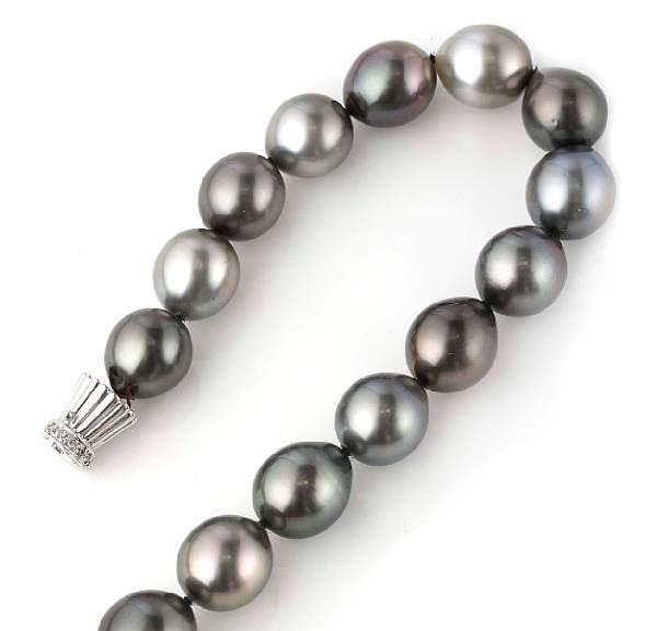 Appraisal: A strand of gray Baroque South Sea cultured pearl with