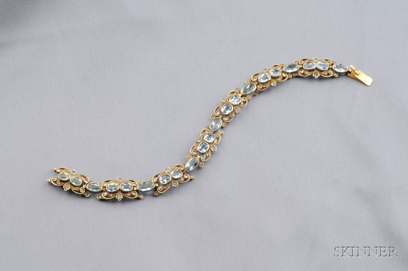 Appraisal: kt Gold Aquamarine and Diamond Bracelet the scrolling links bezel-set