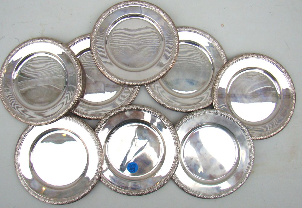 Appraisal: SET OF EIGHT STERLING SILVER BREAD PLATES By International in