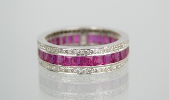 Appraisal: A French Cut Ruby and Diamond Eternity Band k white