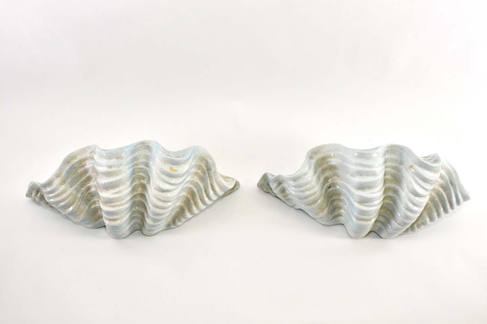 Appraisal: PAIR OF SHELL-FORM MOLDED POTTERY WALL POCKETSWith a white and