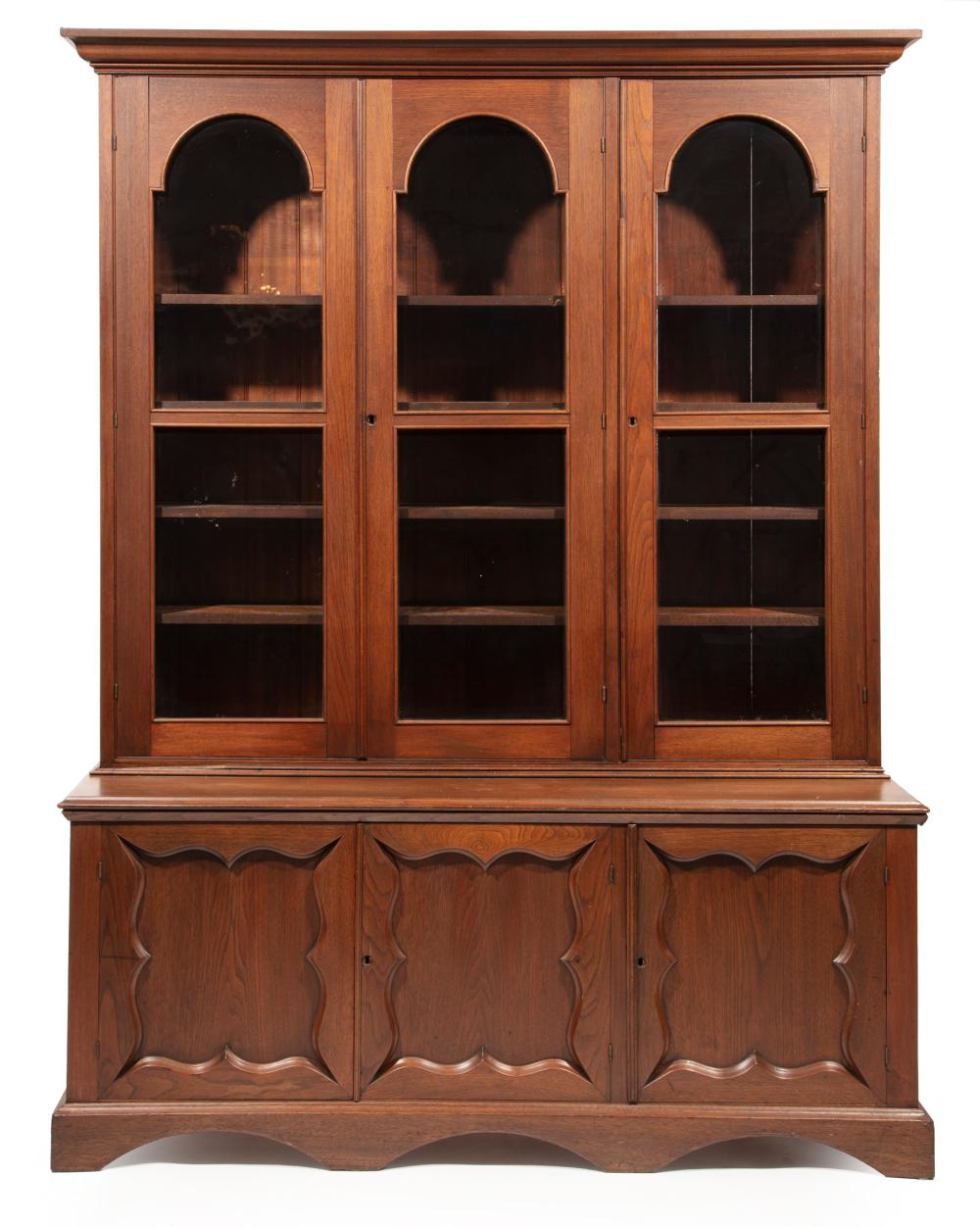 Appraisal: American Late Classical Carved Walnut Bookcase mid- th c ogee-molded