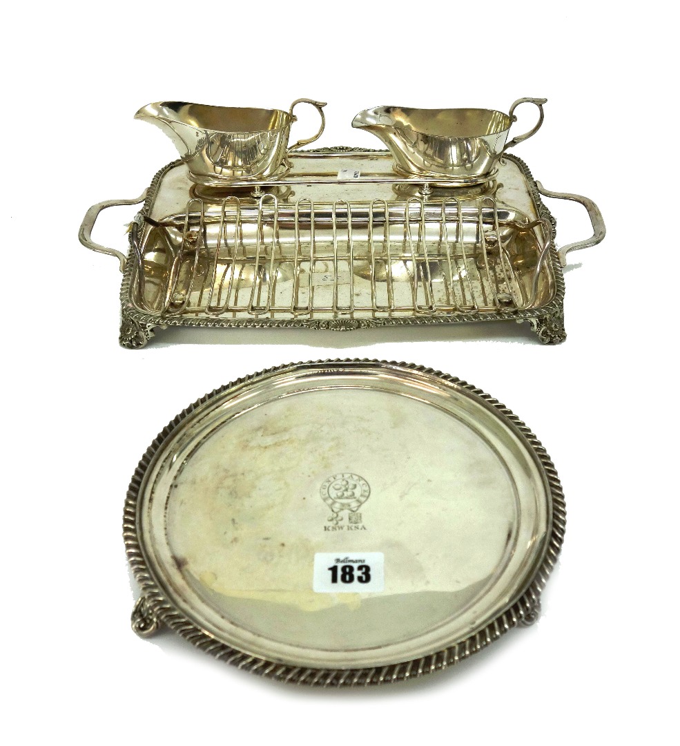 Appraisal: An electroplate two handed asparagus tray with a pair of