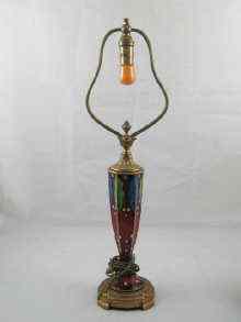 Appraisal: A table lamp in gilt brass the central section ceramic