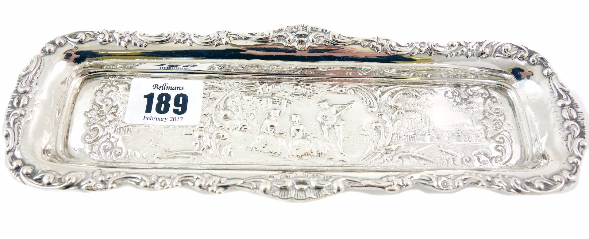 Appraisal: An Edwardian shaped rectangular silver dressing table tray H Matthews