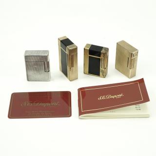 Appraisal: Collection of Four S T Dupont Lighters are enameled with