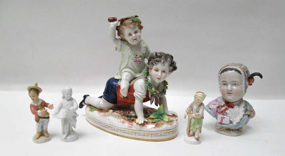 Appraisal: FIVE GERMAN PORCELAIN FIGURINES including KPM miniature standing figures figural