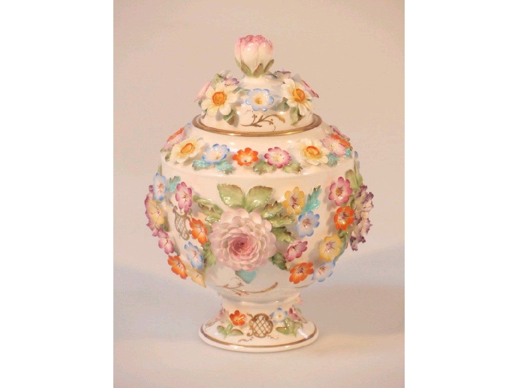 Appraisal: A Coalport Coalbrookdale urn shape vase and cover encrusted with