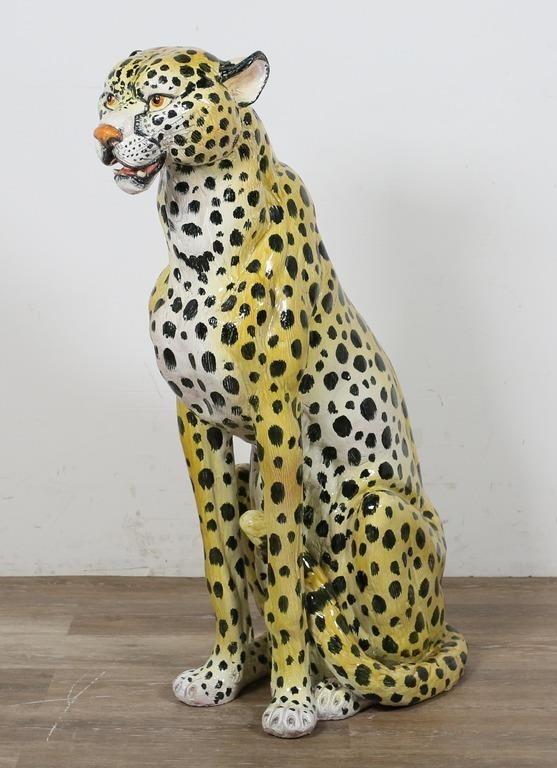 Appraisal: Large painted pottery cheetah sculpture H x W x D