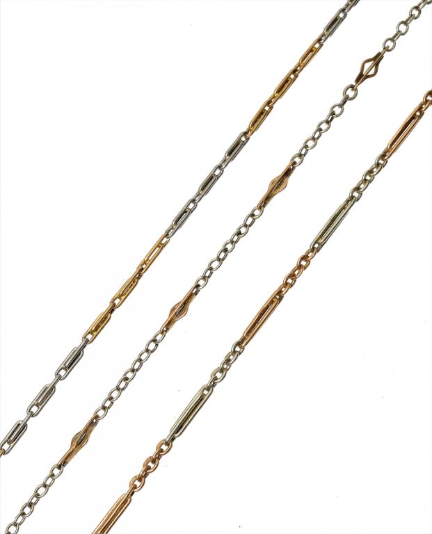 Appraisal: THREE TWO-COLOUR GOLD WATCH CHAINS one marked all c