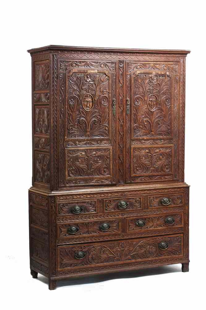 Appraisal: COURT CUPBOARD - th c highly carved oak Continental two-part