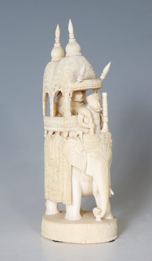 Appraisal: CARVED IVORY ELEPHANT WITH HOWDAH Detailed carved ivory elephant with