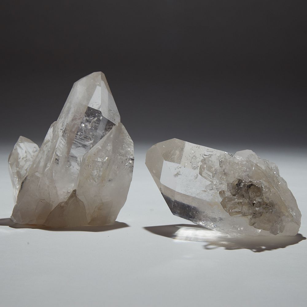 Appraisal: Quartz Crystal Scepters with Associated Points Two quartz crystal scepters