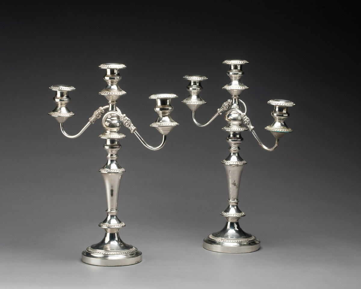 Appraisal: PAIR OF ENGLISH SILVER PLATE THREE LIGHT CANDELABRA WITH GADROONED